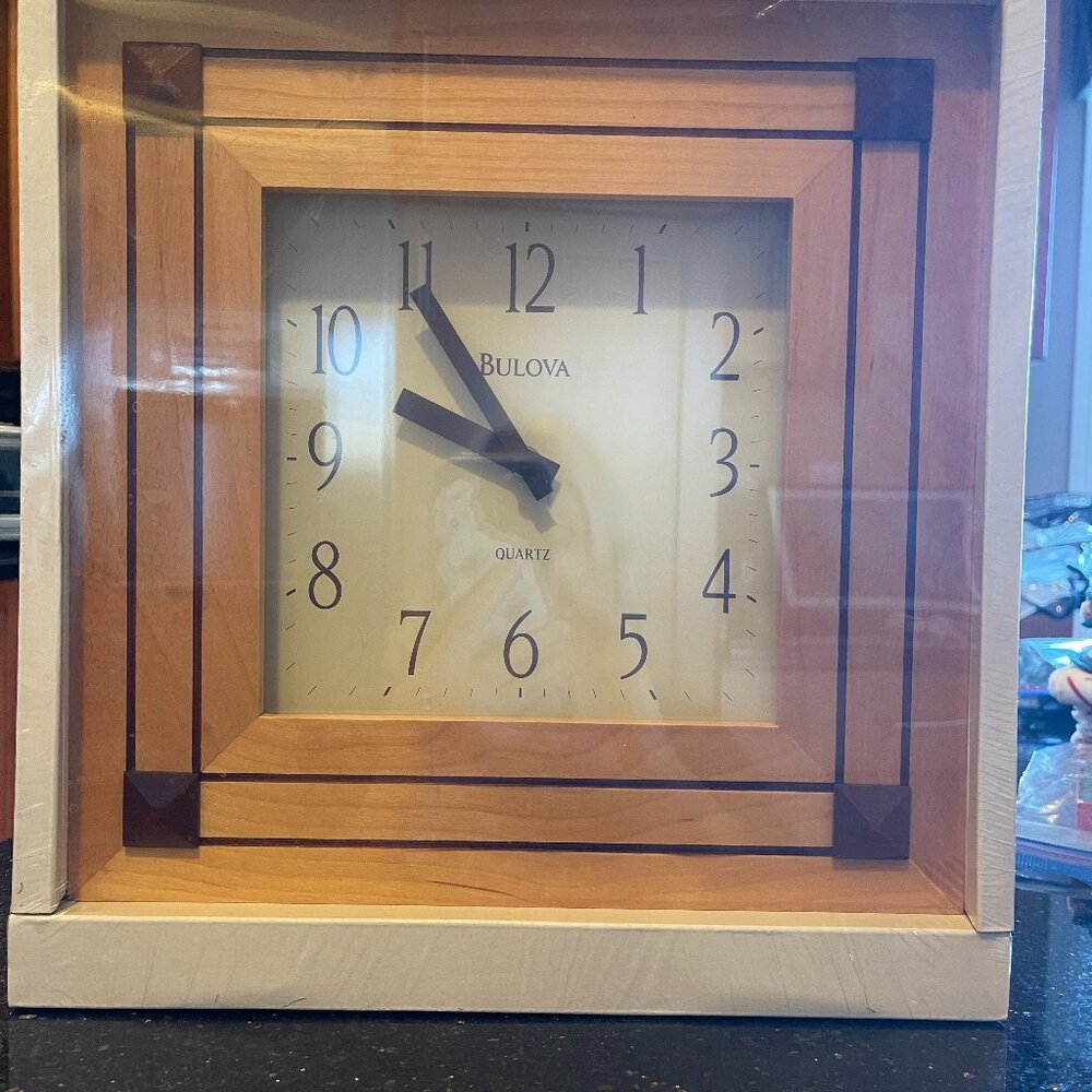 Bulova wall clock.- Item C4231 - Frank Lloyd Wright design